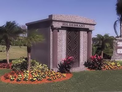 A large gray family mausoleum