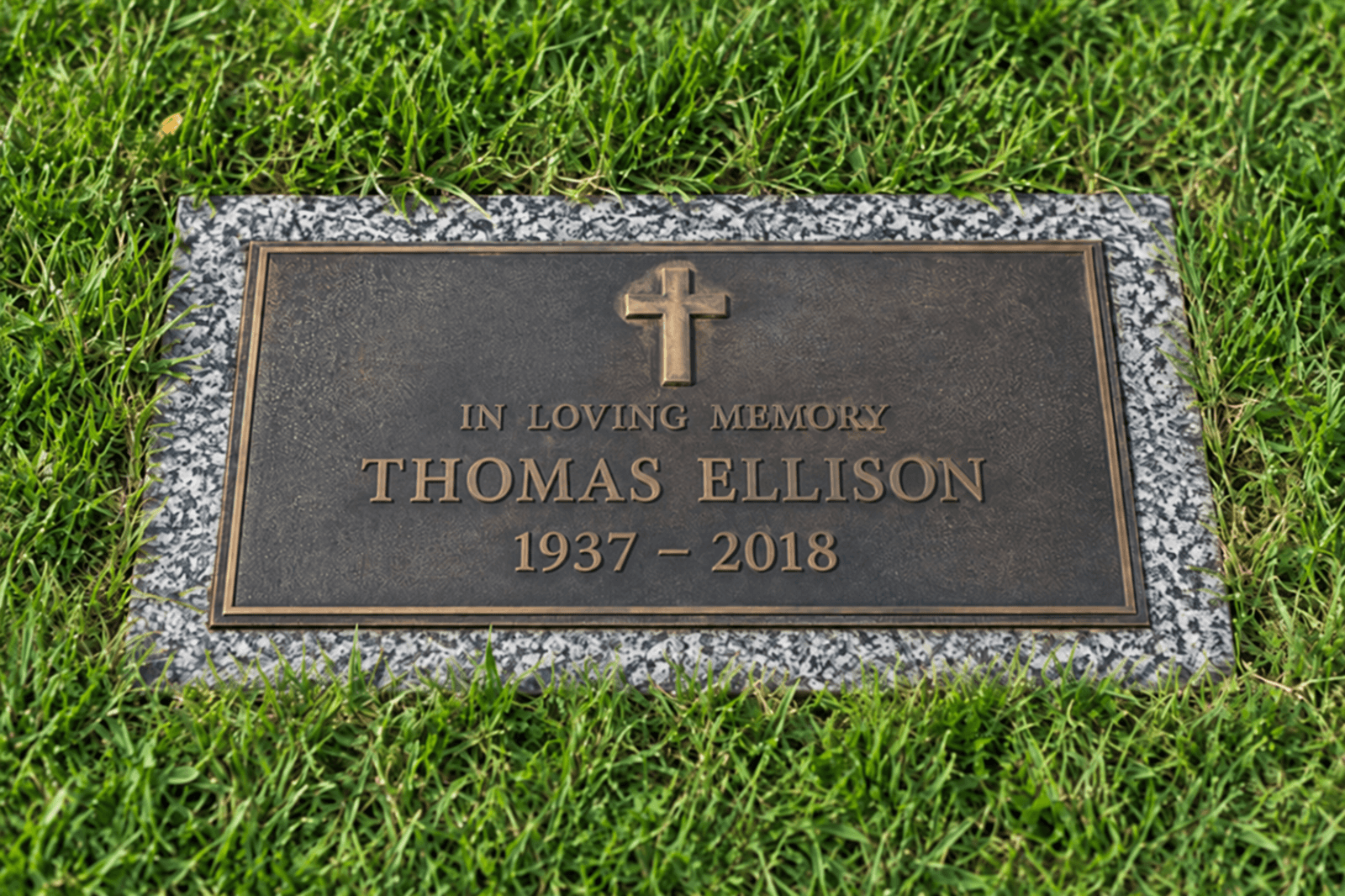 Bronze marker with religious emblem