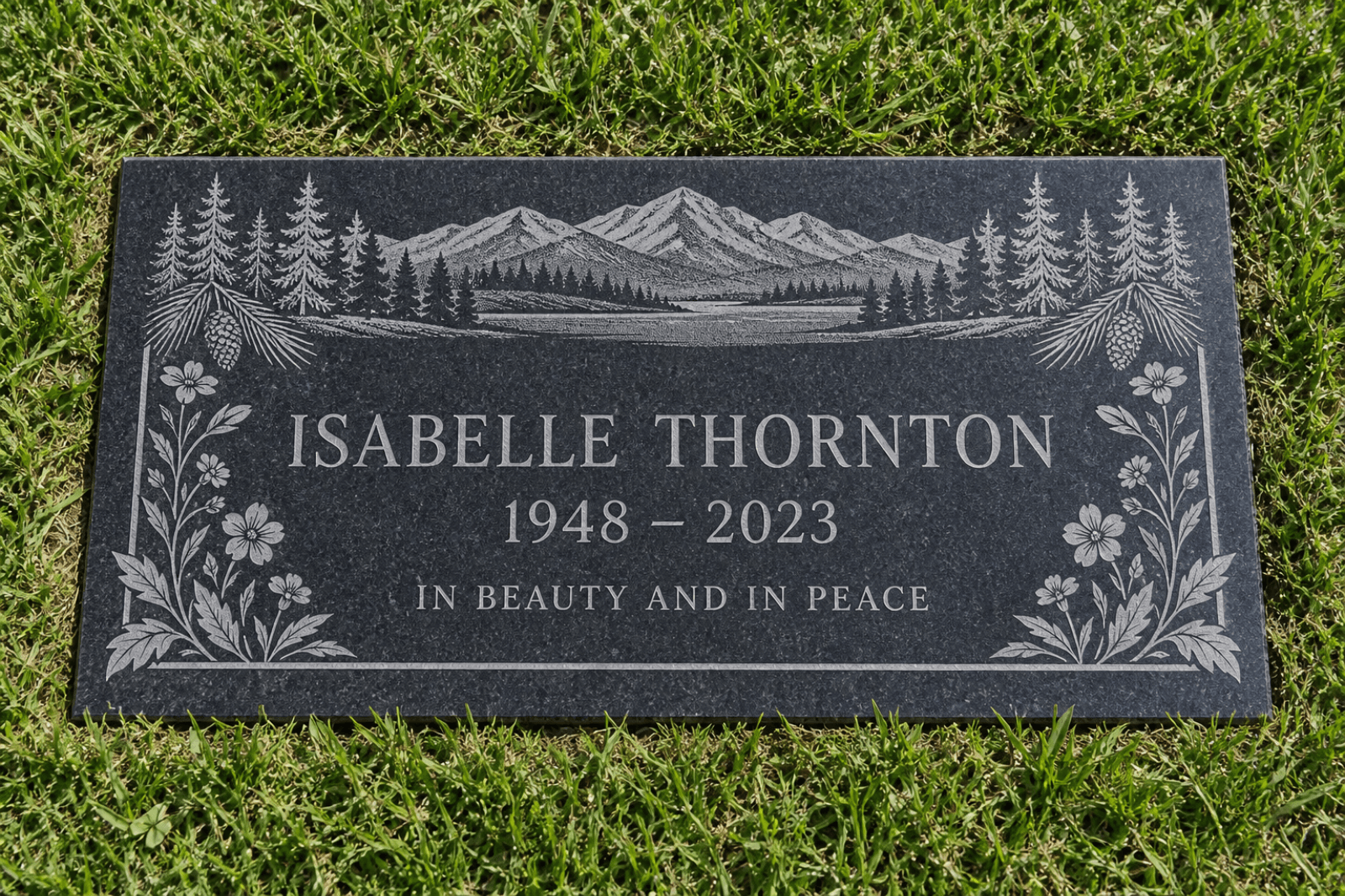 Granite marker with scenic floral border